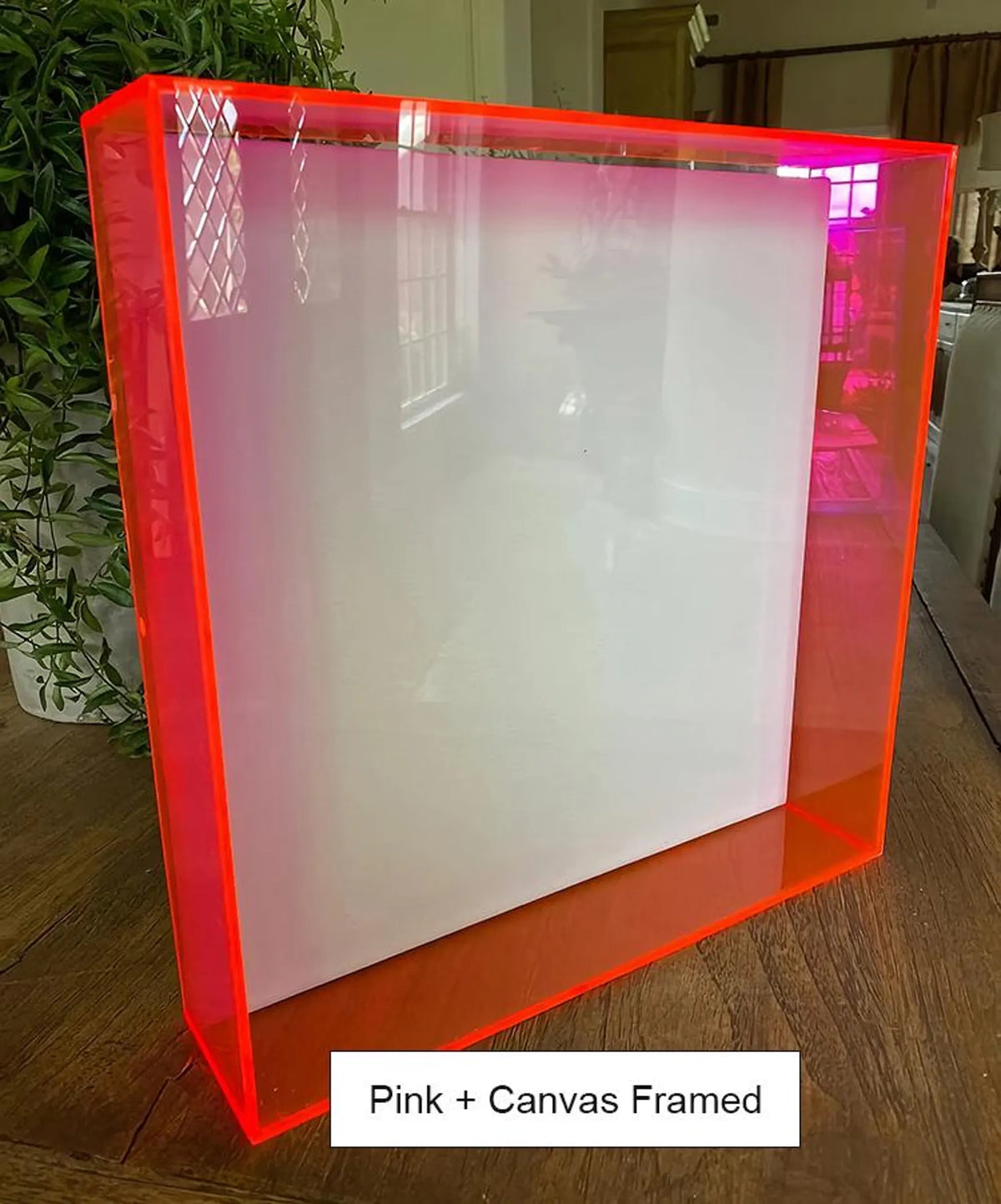 Modern blue acrylic shadow box with blank canvas insert