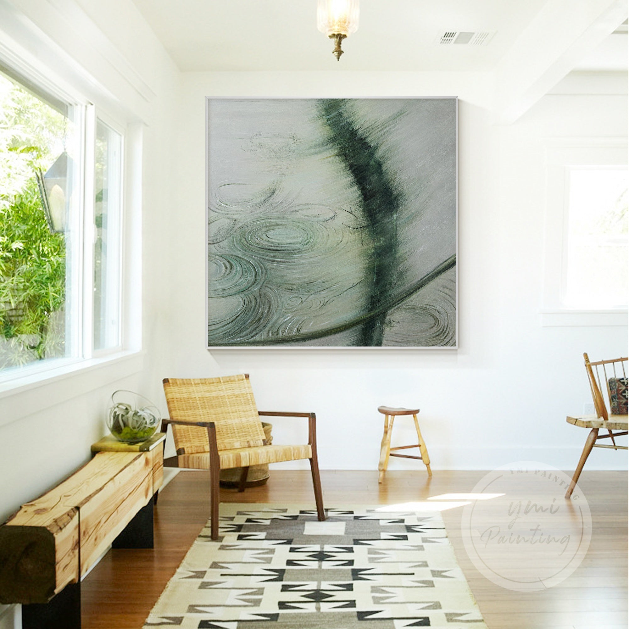 Abstract water-inspired painting with gentle ripples and organic brushstrokes in calm green in silver frame