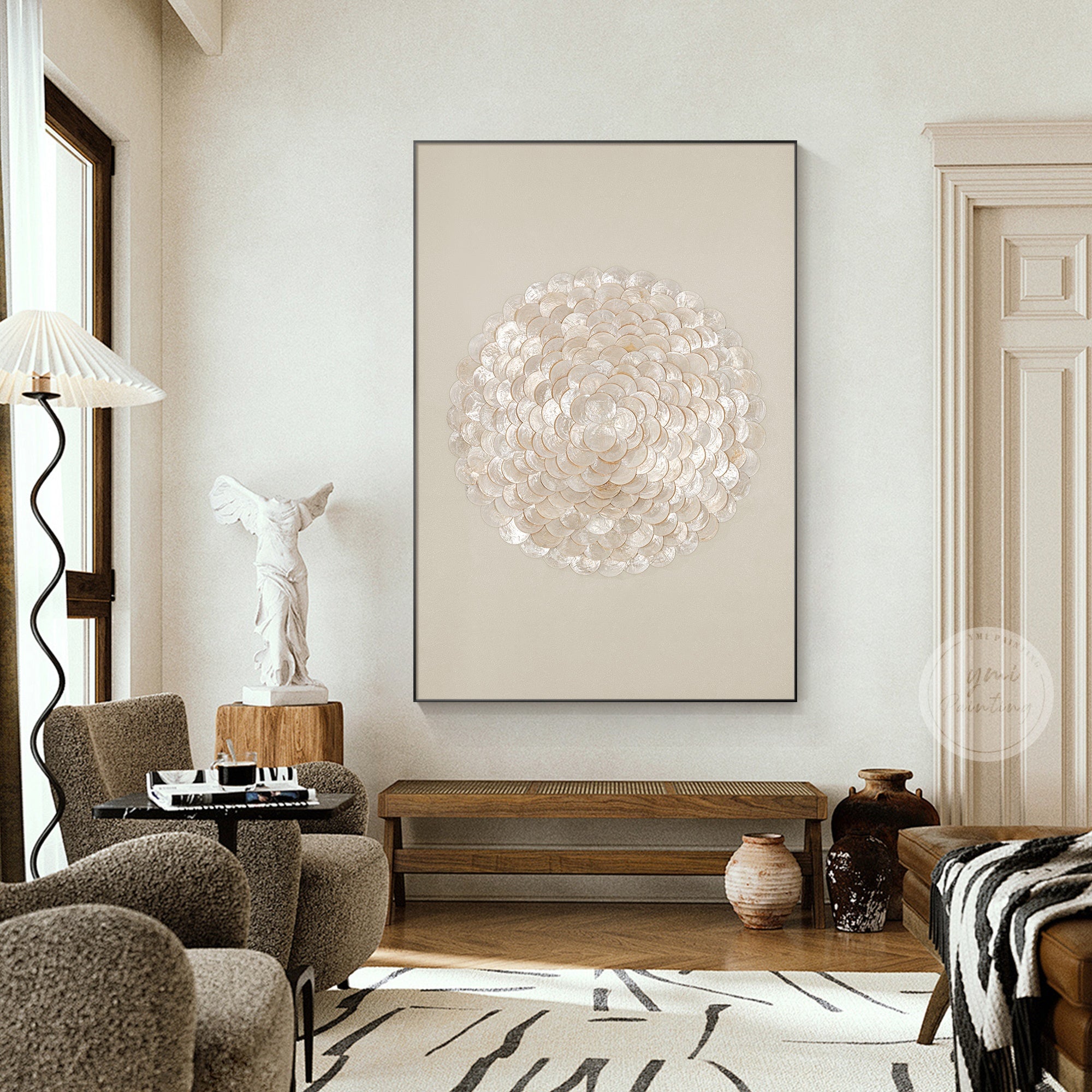 Layered capiz shell wall art on a contemporary living room wall.