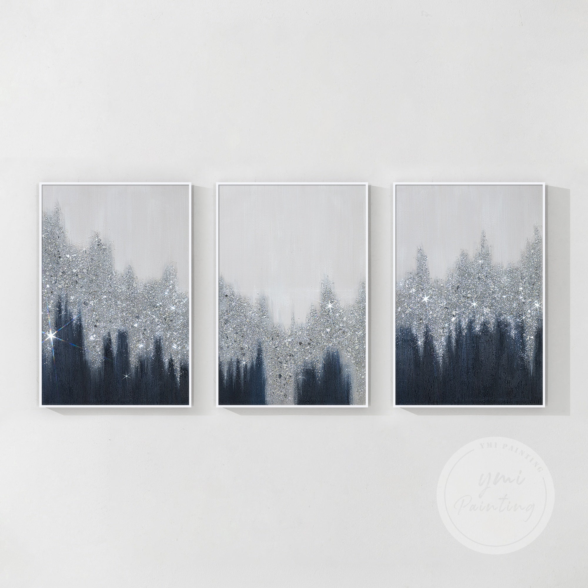 Three-piece minimalist wall art set with silver accents in white frame