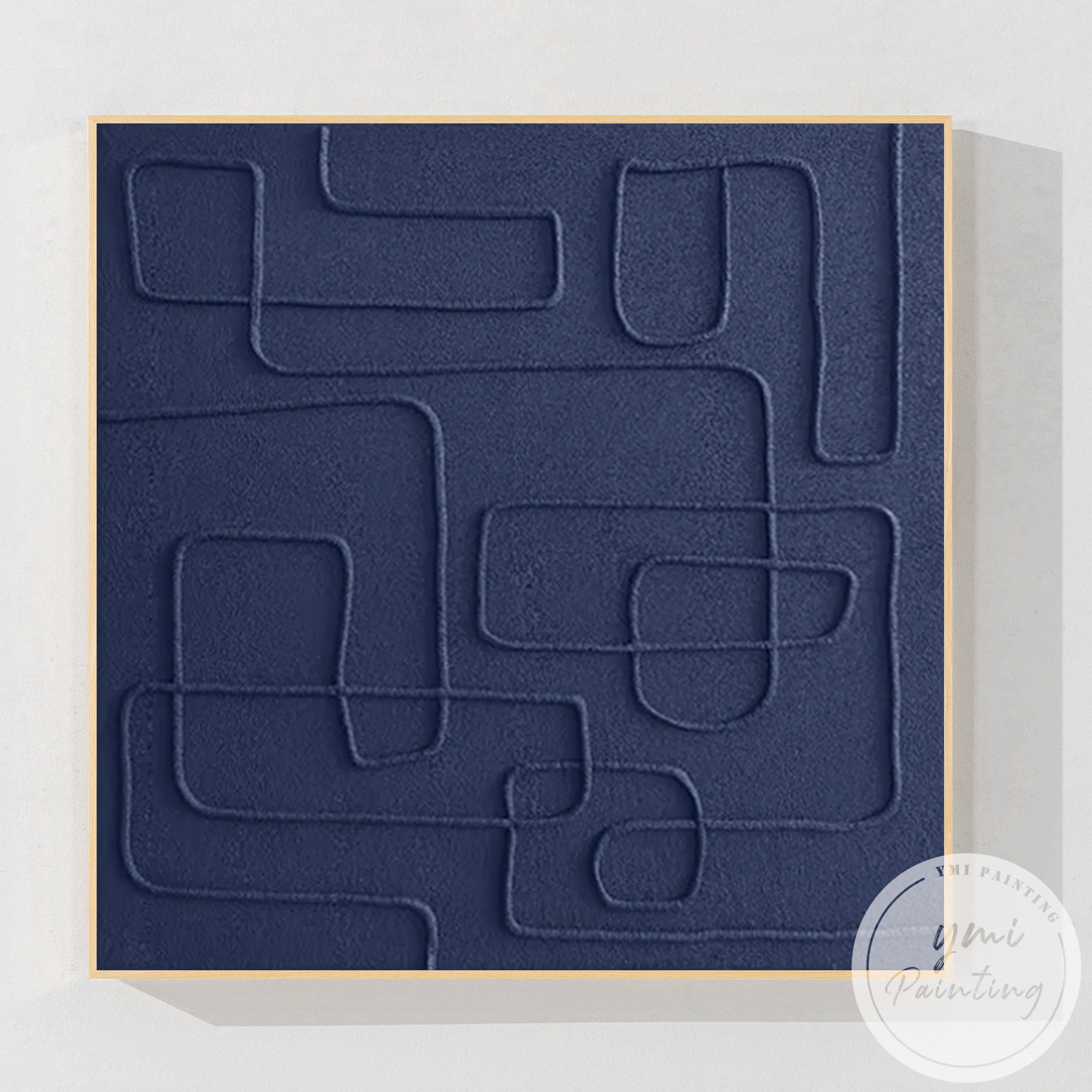 Minimalist square abstract artwork with deep blue textured surface