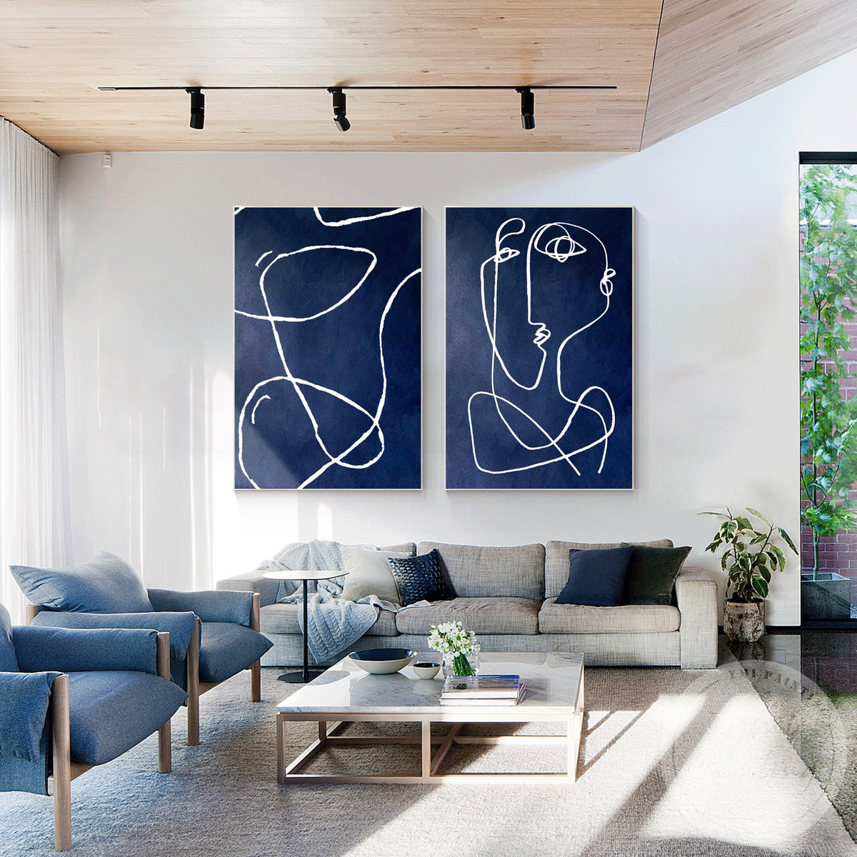 Set of two abstract canvas artworks in navy blue and white