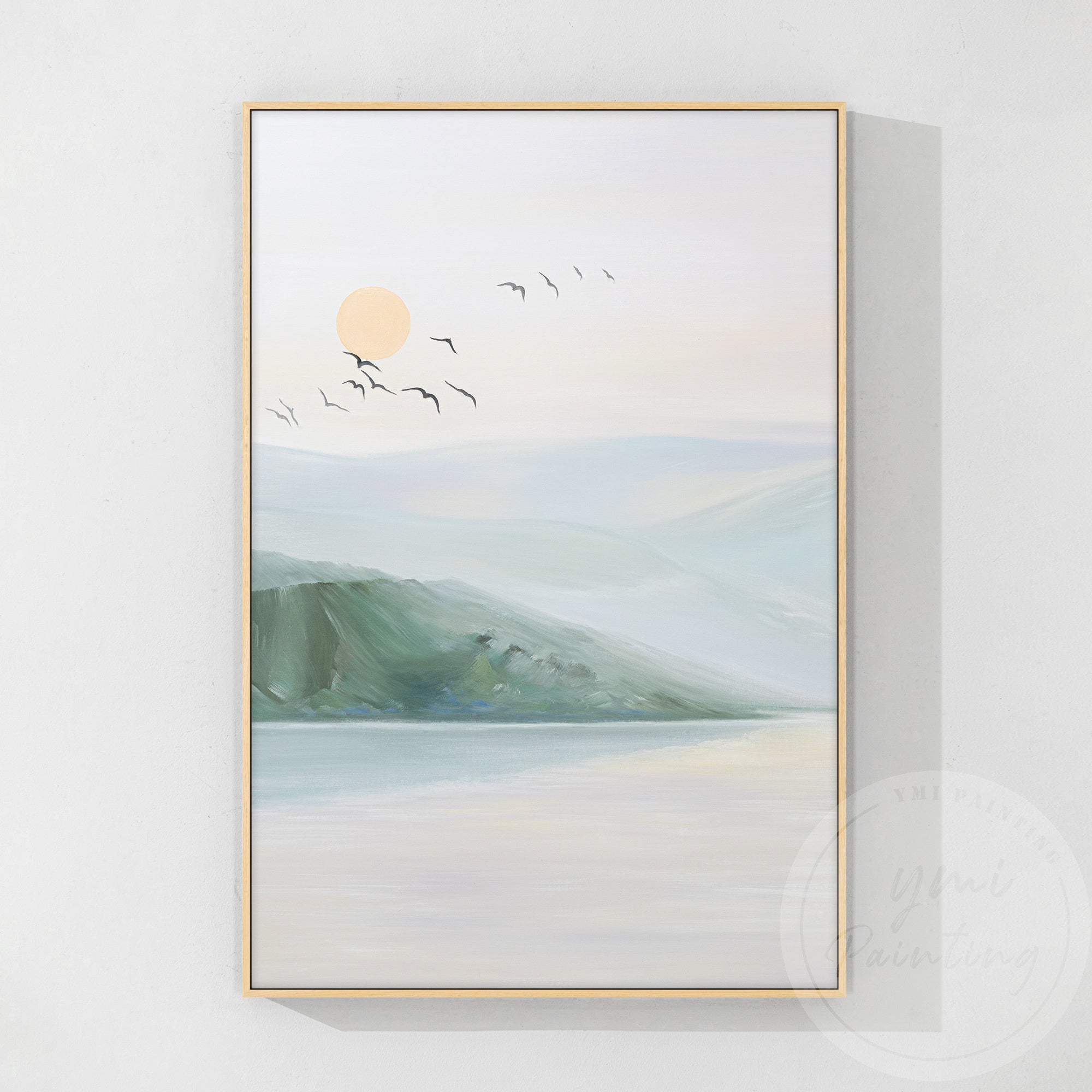 Peaceful sunset over mountains with reflections in still water with a wood frame