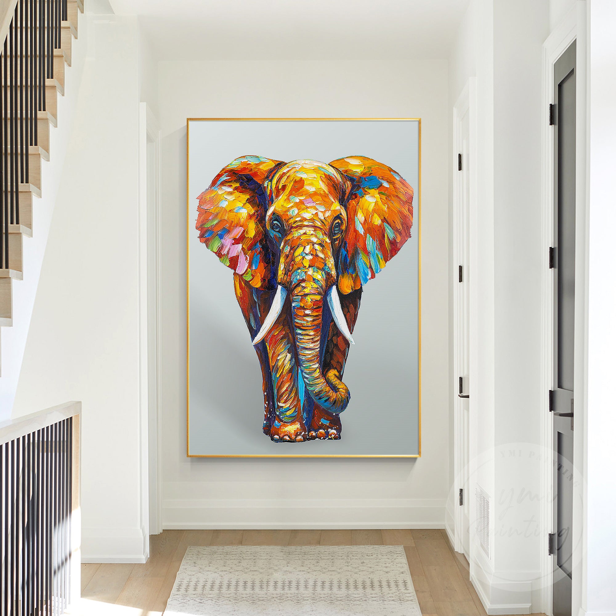 Colorful elephant painting in bold hues of orange, yellow, and blue